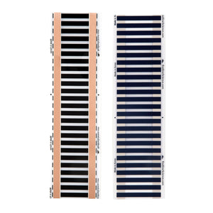 View of both sides of 4 inch wide Redline Science heat tape isolated on a white background