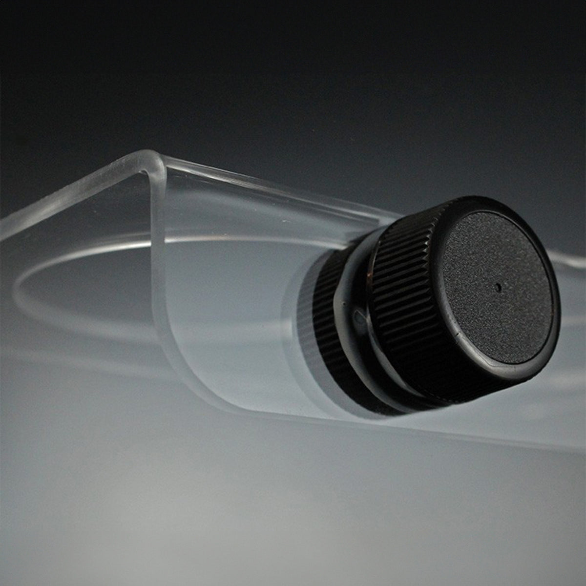 Pangea Small Magnetic Acrylic Ledge close up on magnet from back.