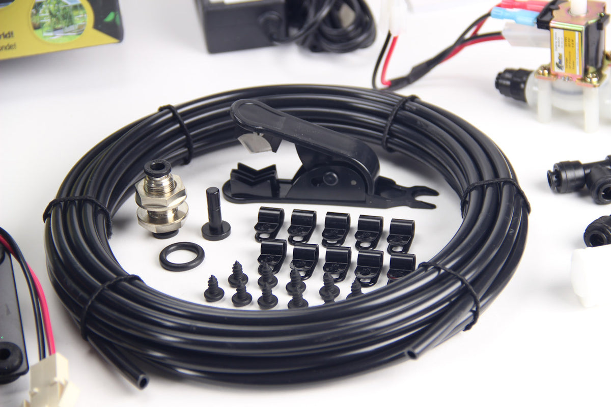 MistKing ultimate misting system tubes and mounting components pictured on a white background