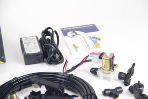 MistKing ultimate misting system power supply, tubing, and nozzles displayed on a white background