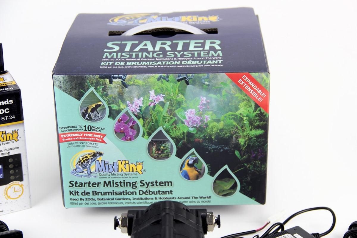 Front view of Mistking starter system box with parts of included components in the frame on a white background